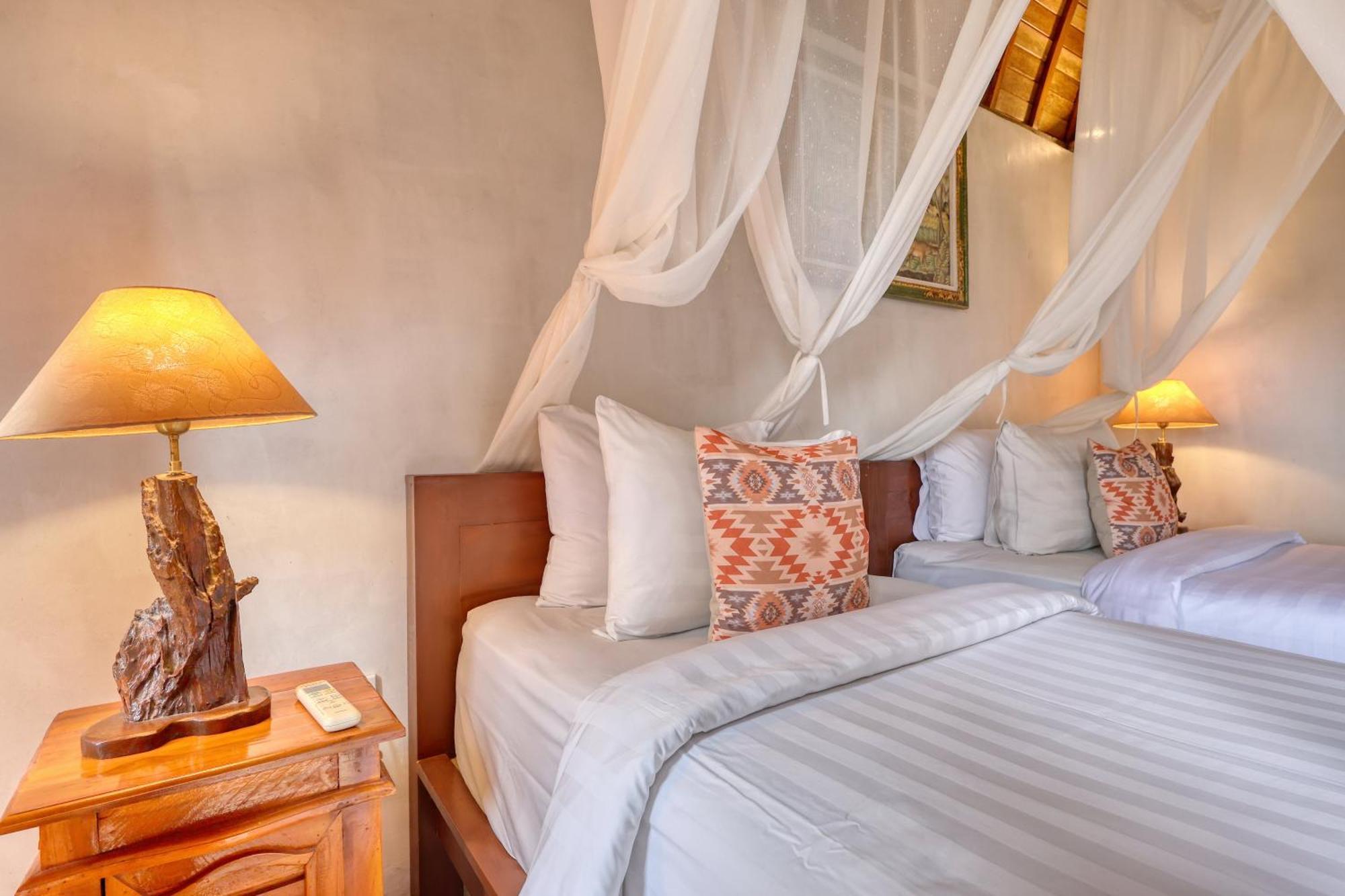 Bagia Bungalows Batumadeg Pokoj fotografie